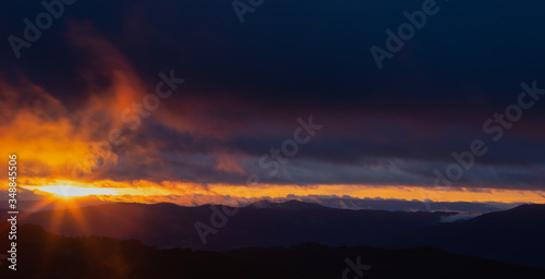 Beautiful sunrise in the mountains with dramatic skies