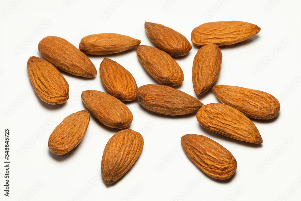 Almonds on white background
