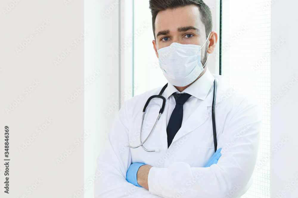 Young and confident doctor in the hospital