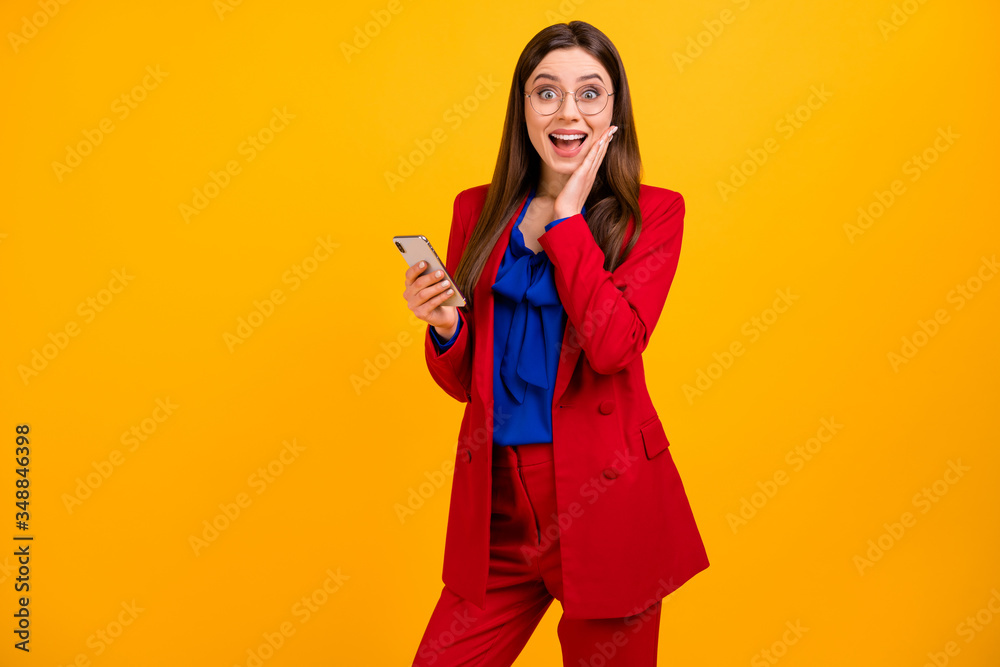 Crazy astonished freelancer girl addicted blogger use cellphone impressed social network novelty scream wow omg wear red blazer jacket pants trousers isolated bright shine color background Crazy astonished freelancer girl addicted blogger use cellphone impressed social network novelty scream wow omg wear red blazer jacket pants trousers isolated bright shine color background