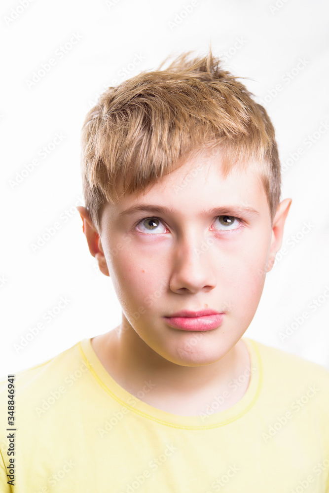 Emotional portrait of a 10-12 years boy. Emotional Portrait of thinking. Emotional portrait of a 10-12 years boy. Emotional Portrait of thinking.