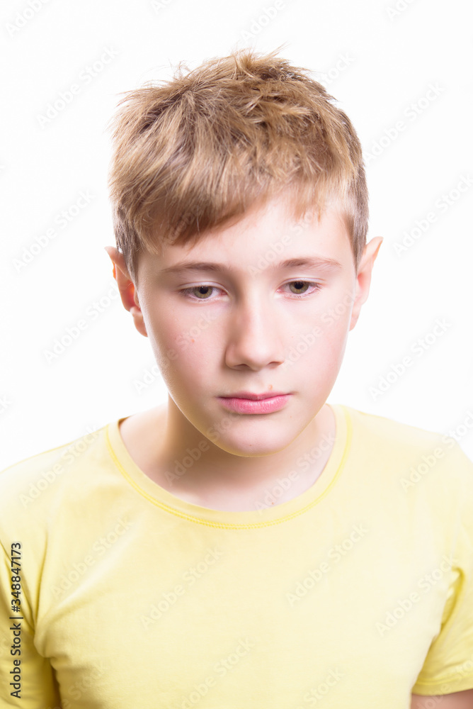 Emotional portrait of a 10-12 years boy. Emotional Portrait of sadness, depression and anxiety. Emotional portrait of a 10-12 years boy. Emotional Portrait of sadness, depression and anxiety.