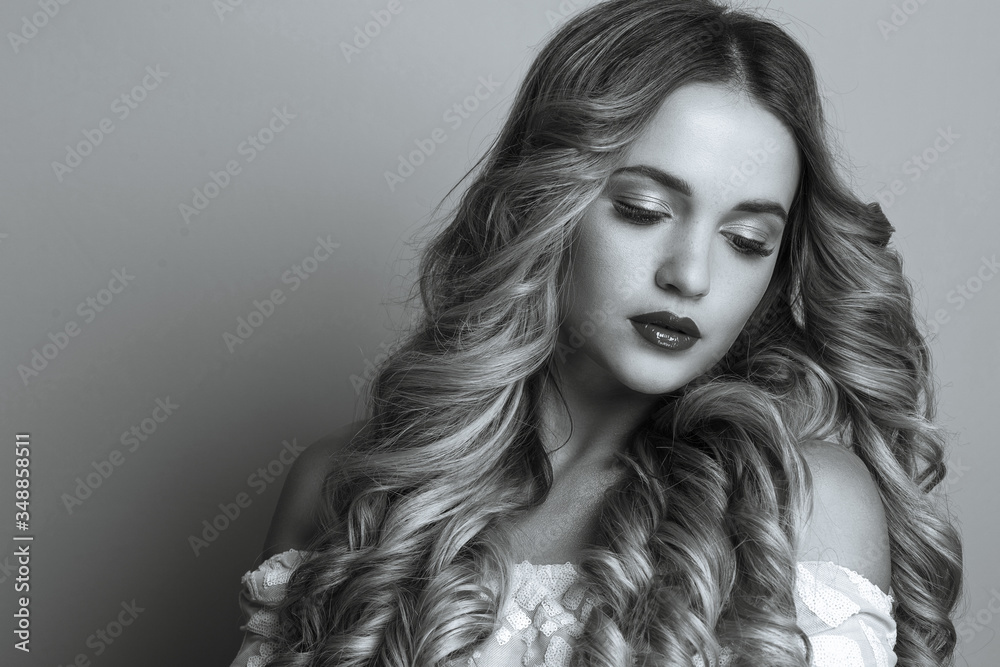 Beauty portrait of luxury model with long wavy hair Beauty portrait of luxury model with long wavy hair