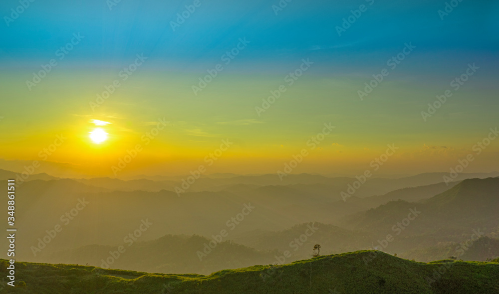Fototapeta premium colorful sunset on top of mountain