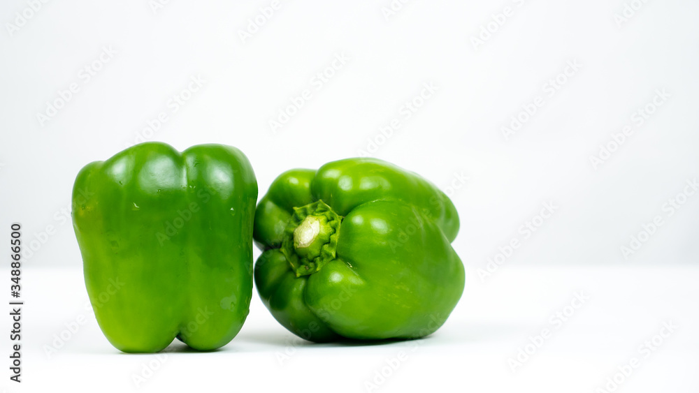 Green bell pepper on white background Green bell pepper on white background
