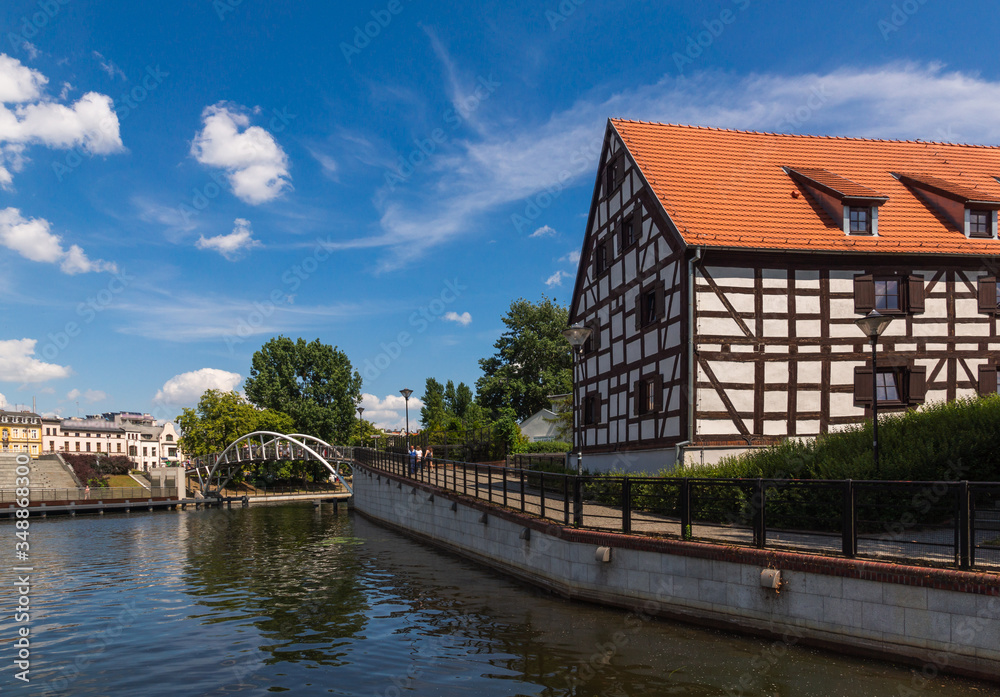 Historic building (White Granary) on the Brda river in Bydgoszcz, Poland