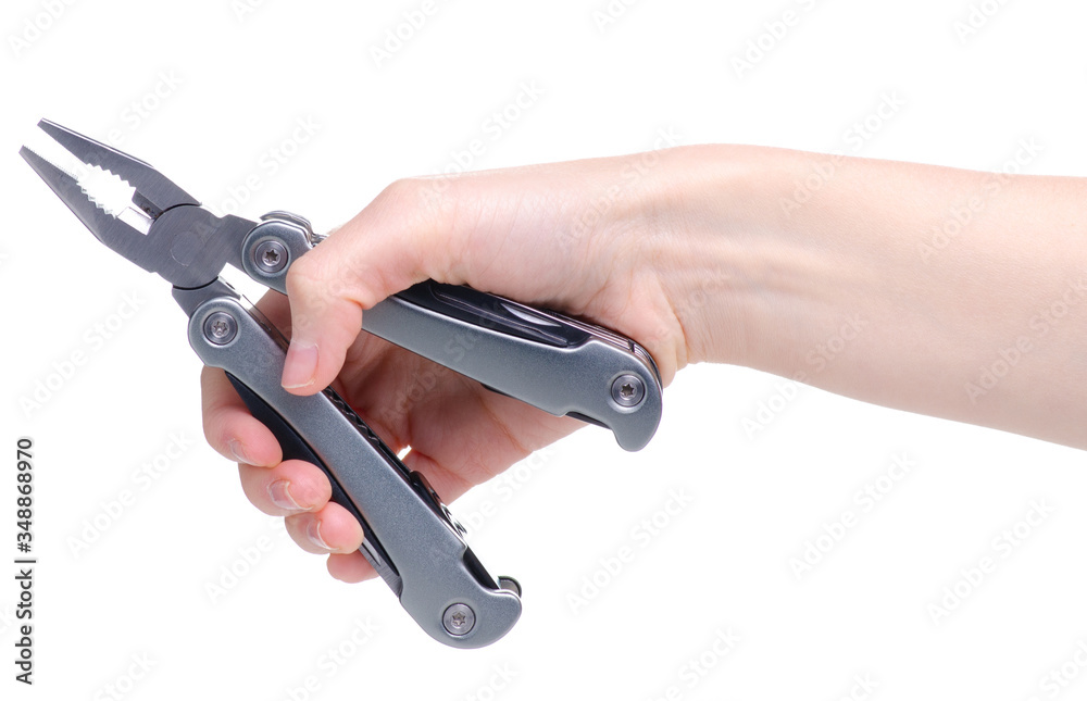 Multitool multi function tool hovers in hand on white background isolation Multitool multi function tool hovers in hand on white background isolation