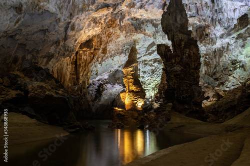 Stalactites and stalagmites and the underground river in a cave