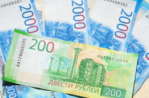 Russian money. New banknotes in denominations of two thousand and two hundred rubles closeup