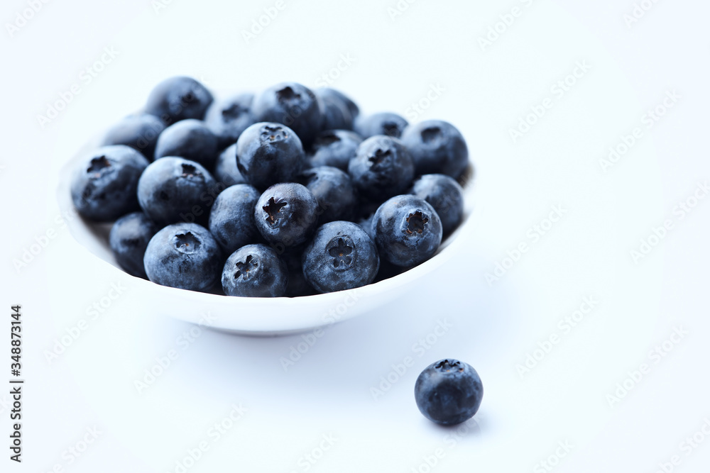 Bilberries isolated on white background. Concept for healthy nutrition. Copy space. Bilberries isolated on white background. Concept for healthy nutrition. Copy space.