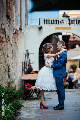 brides walk around the city outdoors, wedding © ostap_davydiak