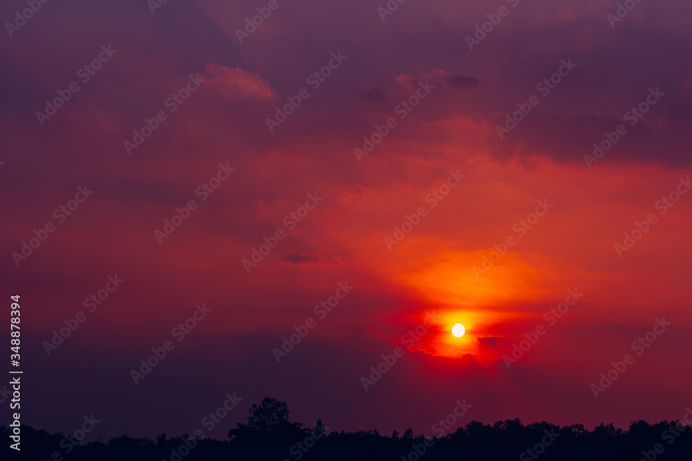 The rising sun shines red. Orange is a beautiful world background