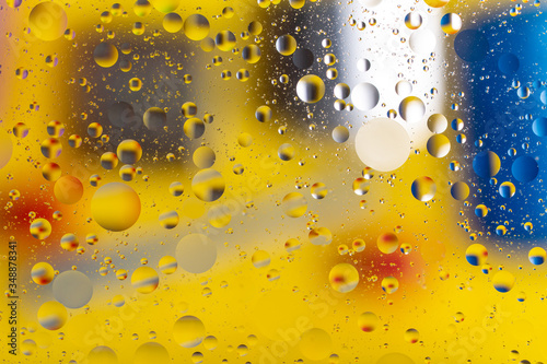 The abstract composition with oil drops in water.