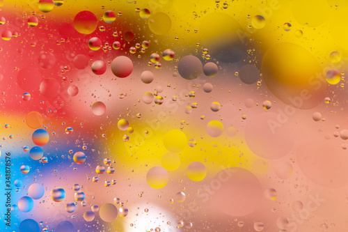 The abstract composition with oil drops in water.