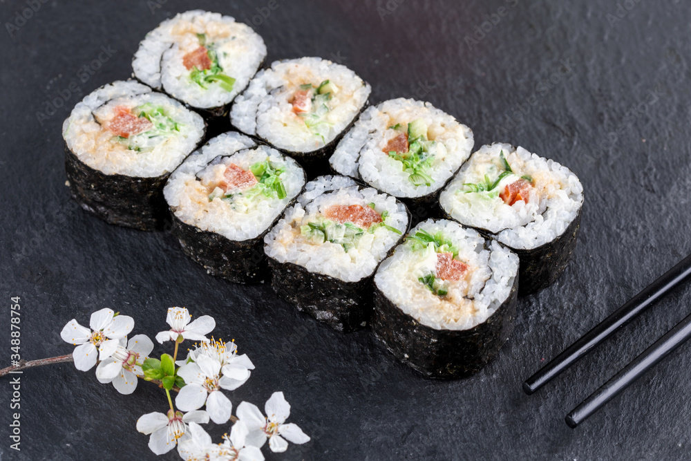 Sushi roll sushi with prawn, avocado, cream cheese, sesame. Sushi menu. Japanese food. Sushi roll sushi with prawn, avocado, cream cheese, sesame. Sushi menu. Japanese food.