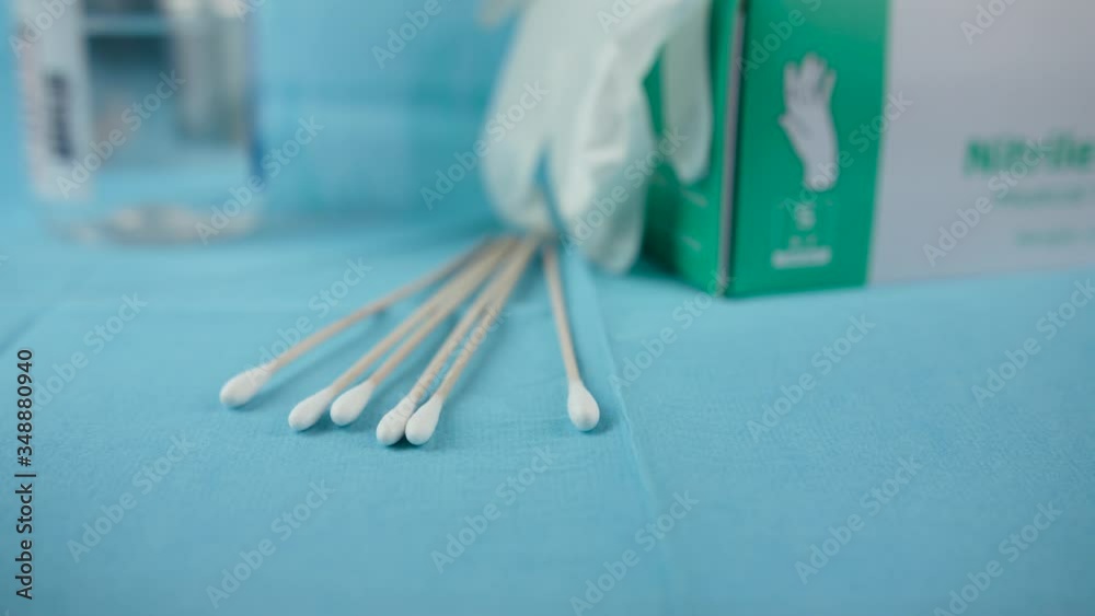 Swabs, disinfectant and gloves in a medical environment. Swabs, disinfectant and gloves in a medical environment.