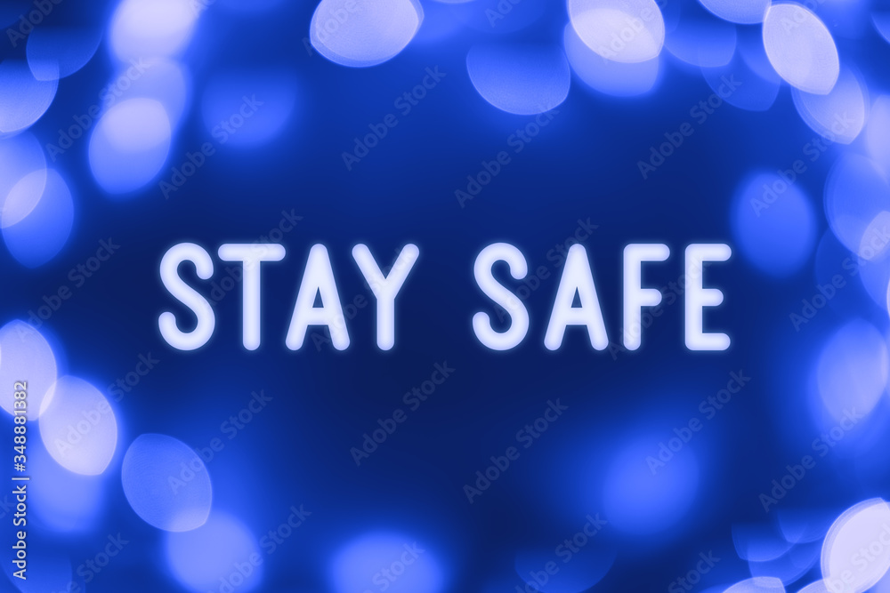 Stay safe - word on a blue background