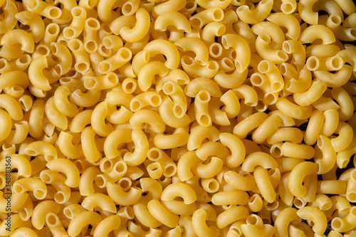 italian dry pasta horns, closeup background scattering, texture