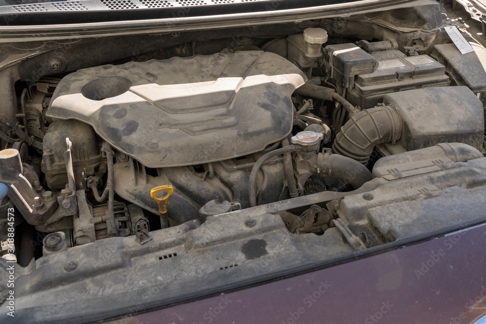 The car mechanic works in the garage. Repair. The car mechanic works in the garage. Repair.