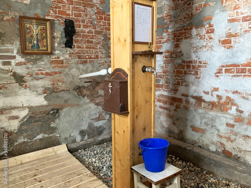 Holy spring in the chapel in honor of the Tikhvin mother of God in the Resurrection Goritsky monastery in Vologda region photo