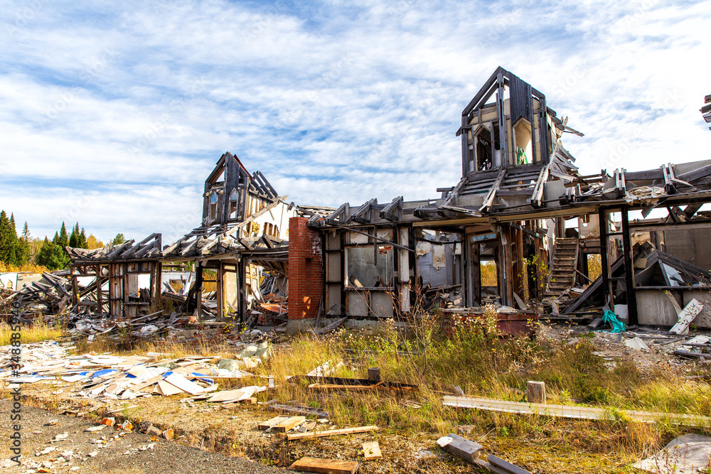 Destroyed residential home at summer day Destroyed residential home at summer day