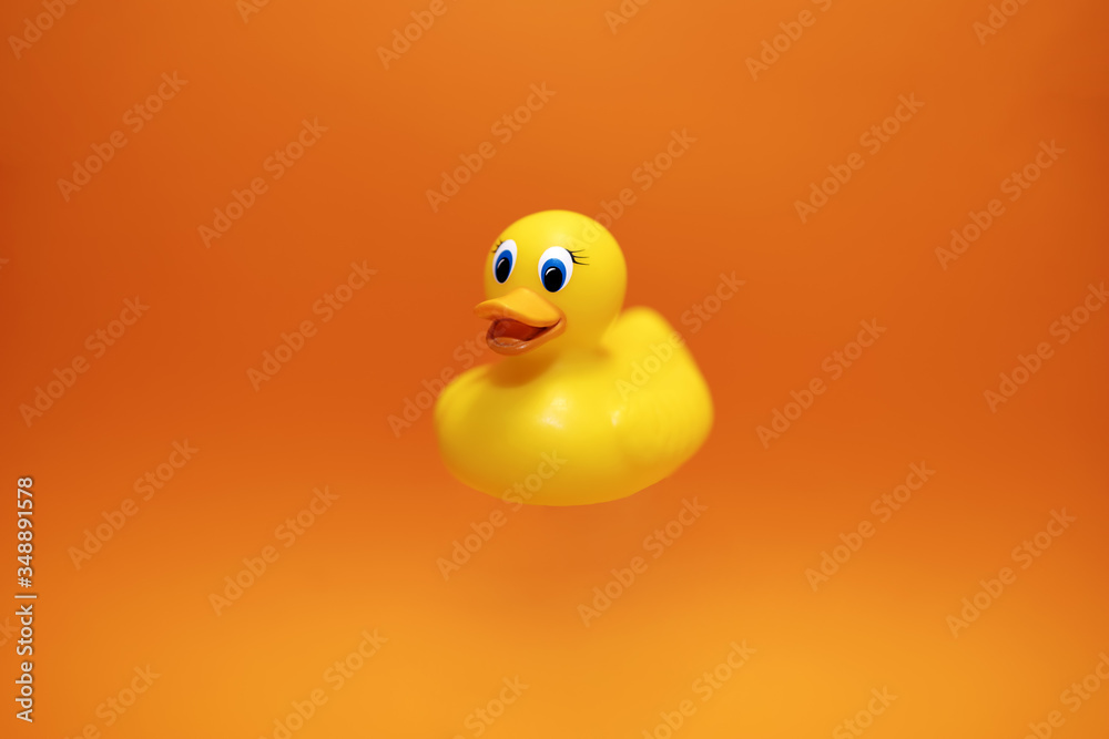 Yellow duck on the orange background Yellow duck on the orange background