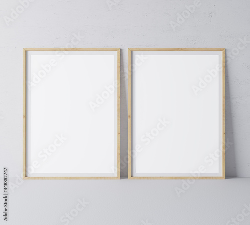 Vertical wooden empty frames in modern design on minimal gray background, A3, A4 size