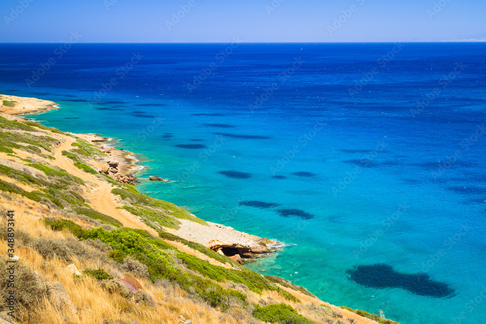 Turquise water of Mirabello bay at the coastline of Crete, Greece
