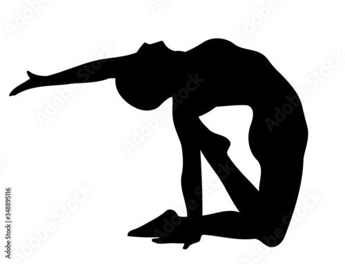 silhouette of a woman doing yoga