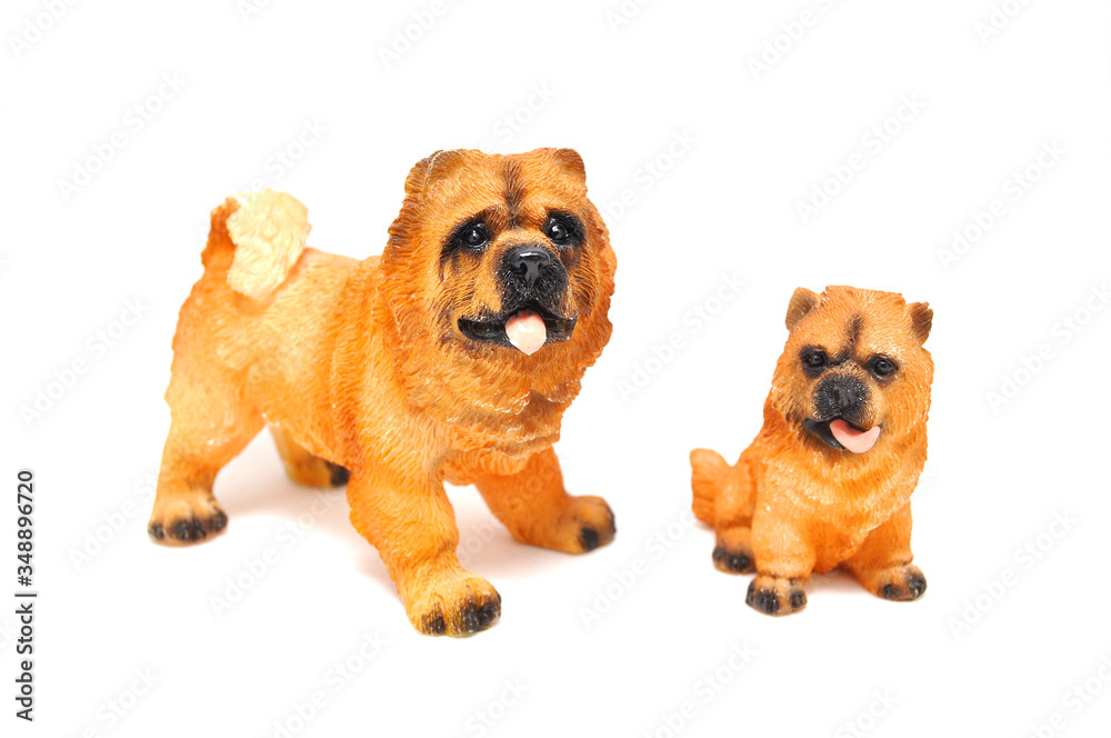 Obraz premium Dog figurine close-up on a white background