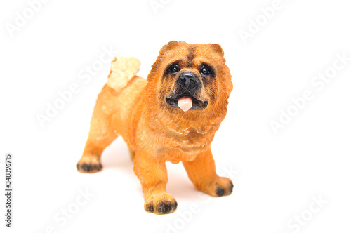 Dog figurine close-up on a white background