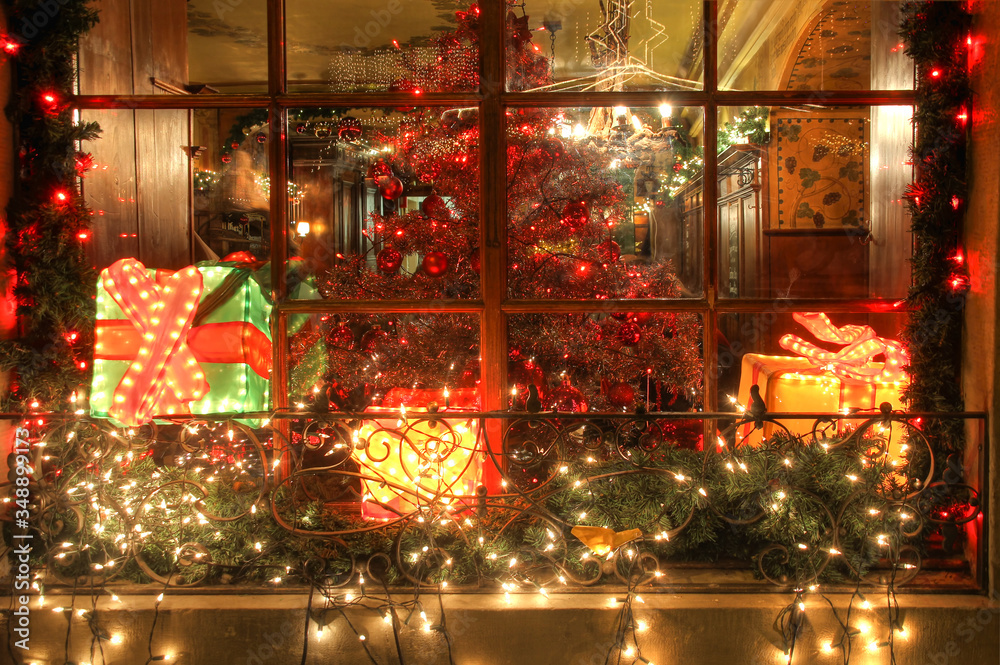 Beautifully decorated restaurant window during Christmas season