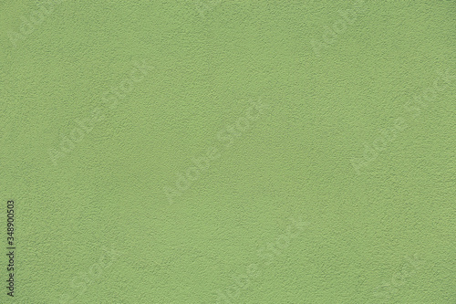 Green textured wall. Background