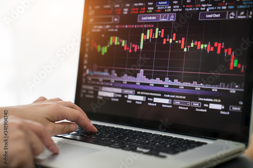 Analysis graph stock market trading with stock chart data, financial and investment concept.