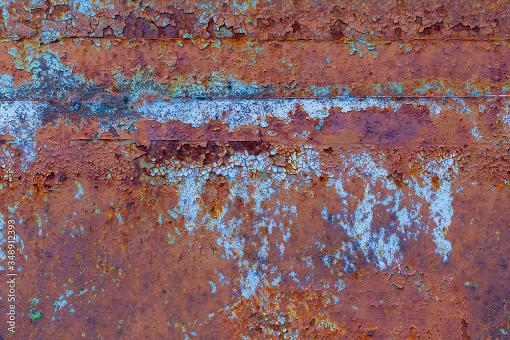 Rusty background.Rust.Texture of old rusty iron.Red-brown rust covered the metal. Rusty background.Rust.Texture of old rusty iron.Red-brown rust covered the metal.