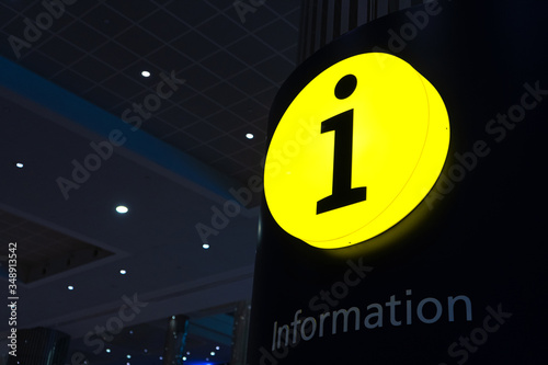 Glowing yellow sign Information desk. Reference Information. Help box