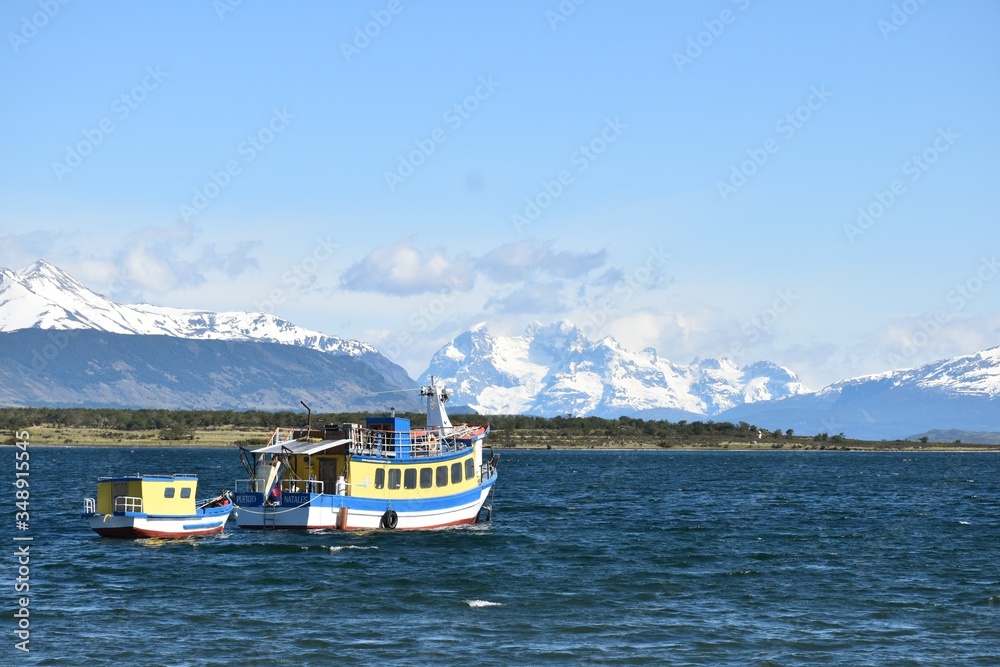 boat on the sea,mountains,nature,tourist,blue sky,nice view,beautiful day