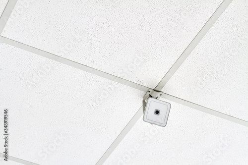 White webcam on the ceiling