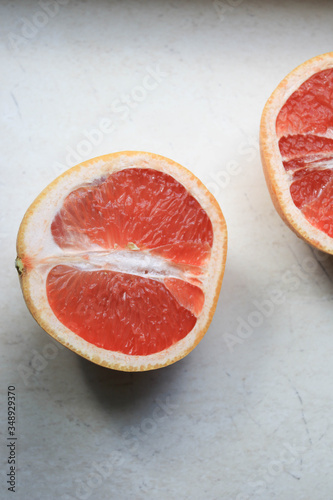 Grapefruit halves on the table