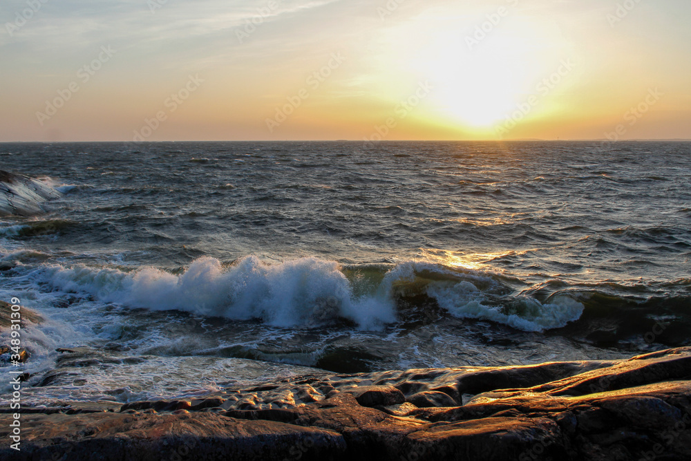 Waves of the Baltic sea at sunset