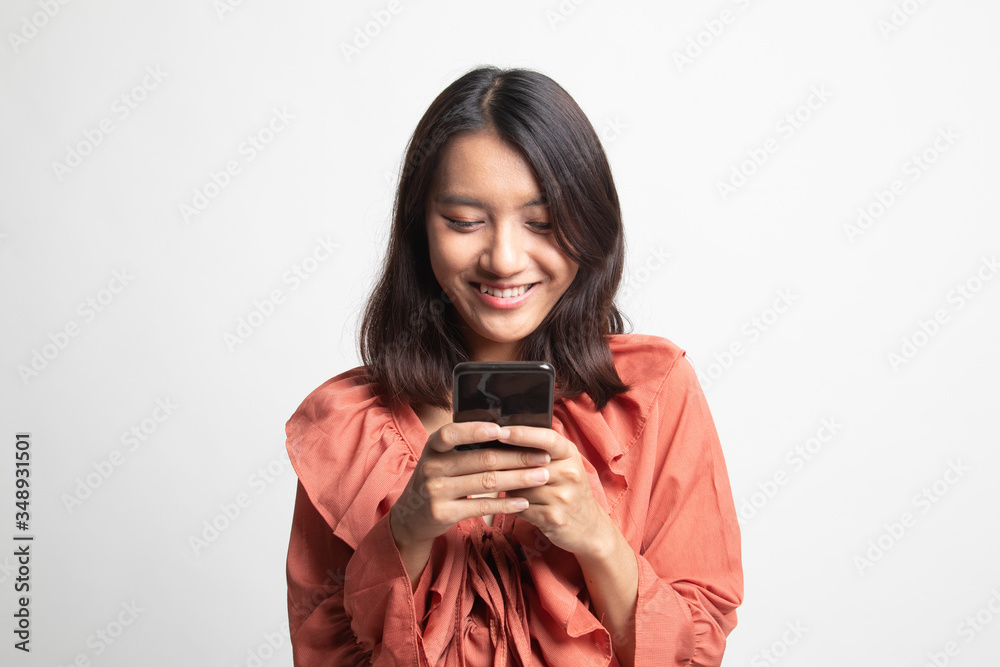 Young Asian woman with mobile phone . Young Asian woman with mobile phone .