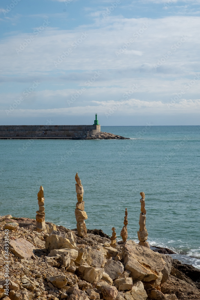 
Stone sculptures in Zen balance on the south coast of Peñíscola, Mediterranean Sea