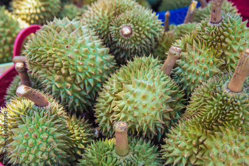 Close up many durian is in the basket in front of the market  Durian is a tropical fruit in Thailand that is very popular.