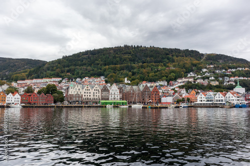 Sea water view on historical buildings in Hanseviertel Bryggen wharf in Bergen, Norway. UNESCO World Heritage Site