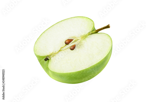 Konstfotografi Green apple half with seeds isolated on white