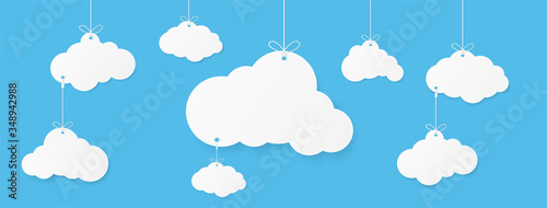 Cloud banner for advertising on blue sky. Copy space. Speech Bubble, White blank hanging. Vector illustration