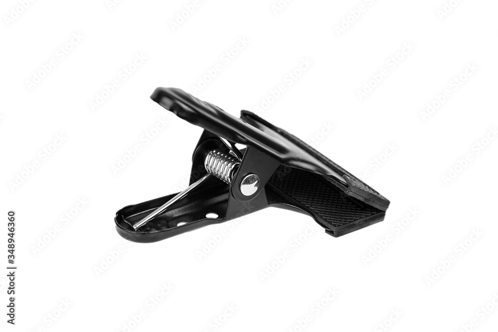 Clamp, spring clip with rubber protective sleeve, isolated on white background Clamp, spring clip with rubber protective sleeve, isolated on white background