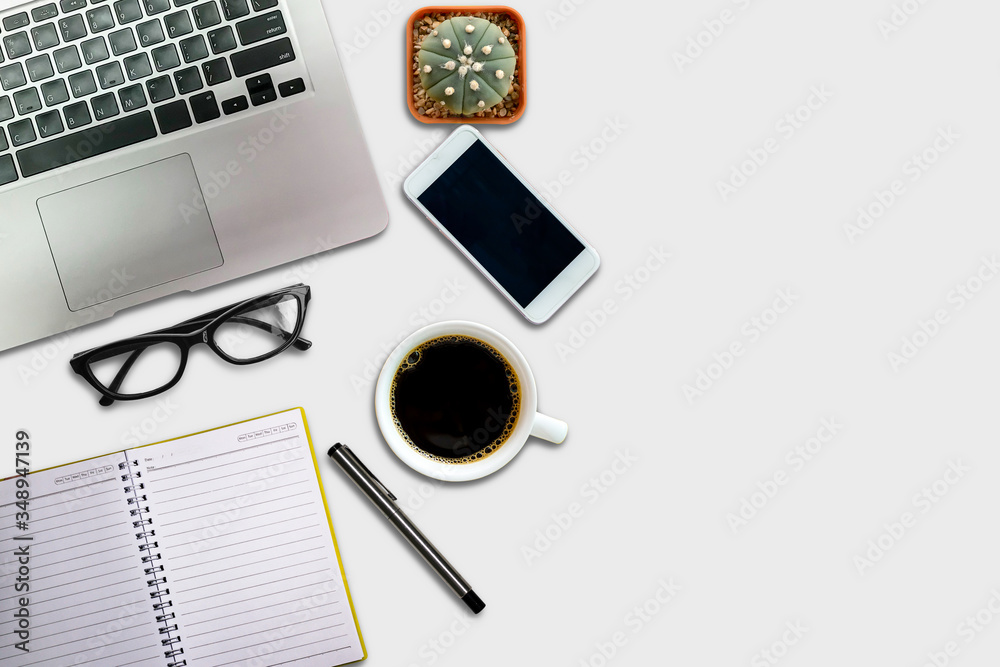 Office desk notebook pen with accessories and coffee cups Top view with copy space Office desk notebook pen with accessories and coffee cups Top view with copy space