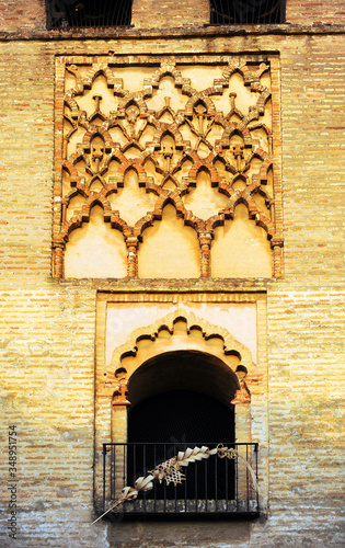 Campanario de la iglesia mudéjar de Omnium Sanctorum en Sevilla, España. photo