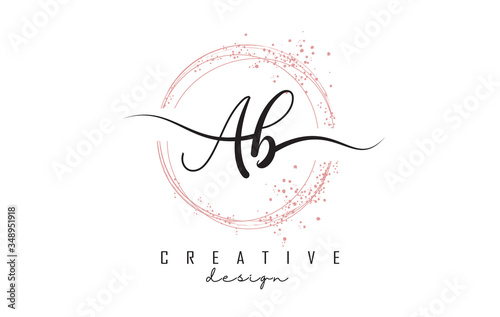 Handwritten AB a b letters logo with dust pink sparkling circles and glitter.
